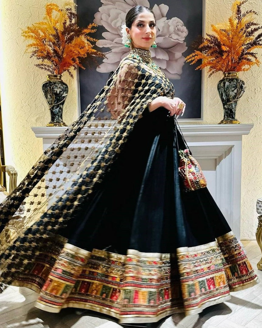 Black georgette heavy embroidered designer anarkali gown with hand bag