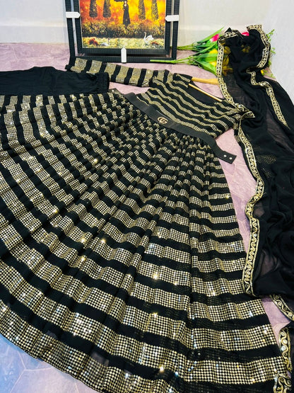 Black georgette heavy sequence work partywear gown with gucci belt