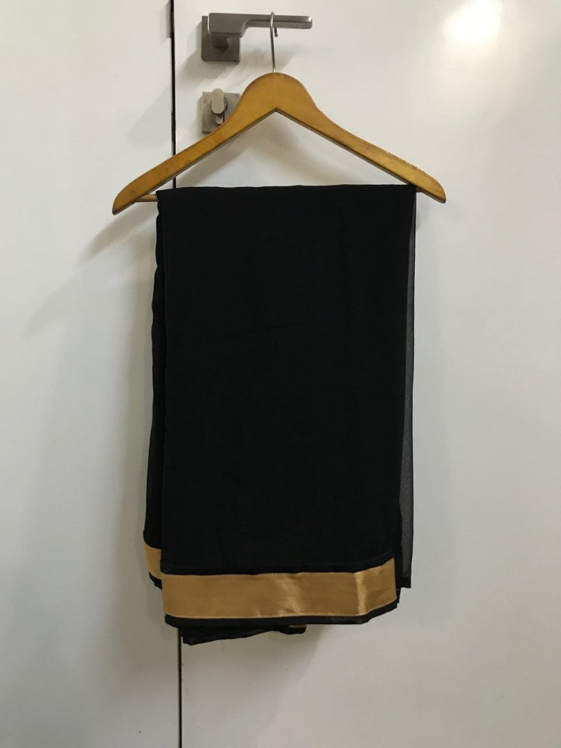 black georgette partywear saree with embroidered blouse