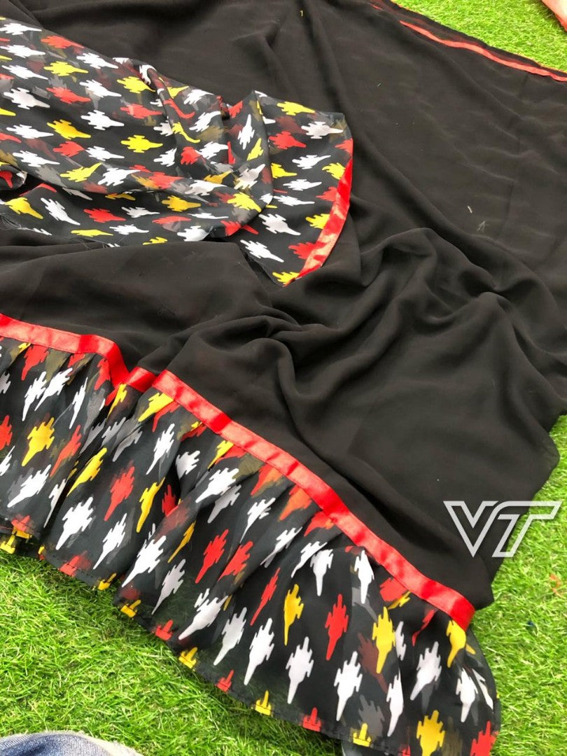 black georgette partywear saree with printed ruffle border