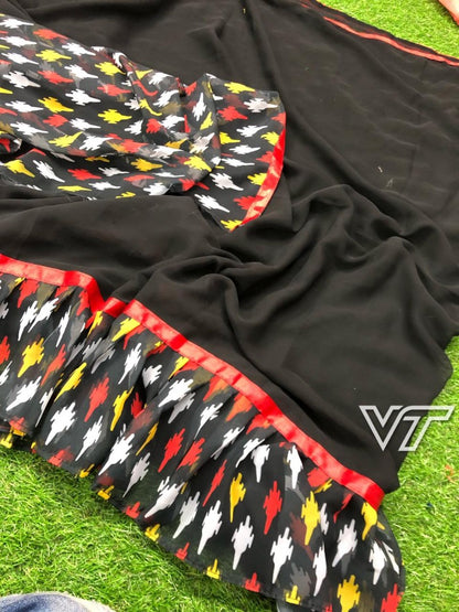 black georgette partywear saree with printed ruffle border