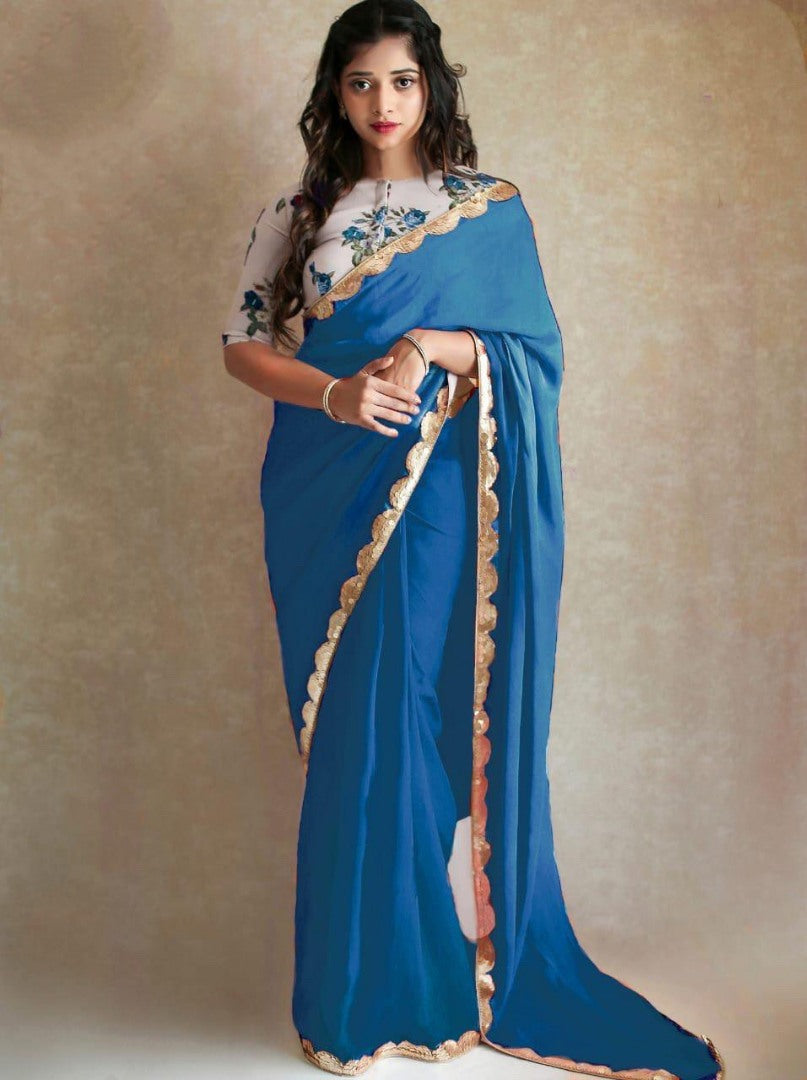 Black georgette partywear saree with sequence work gold border