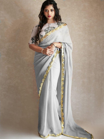 Black georgette partywear saree with sequence work gold border