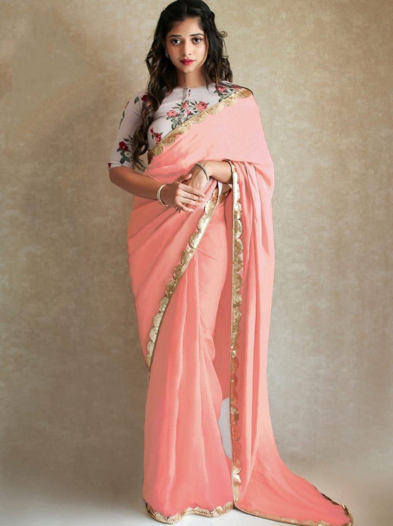 Black georgette partywear saree with sequence work gold border