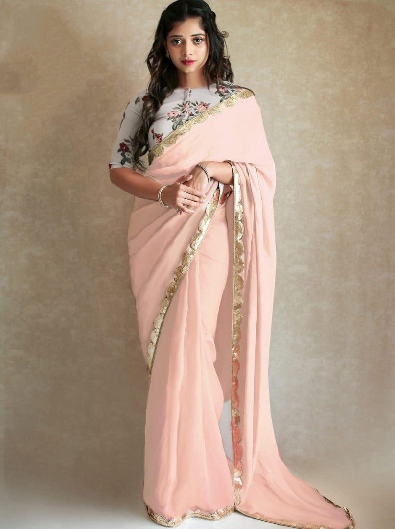 Black georgette partywear saree with sequence work gold border