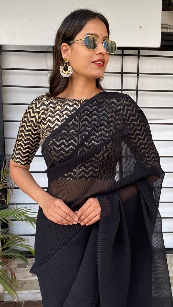 Black georgette pleated partywear saree with heavy sequence work blouse