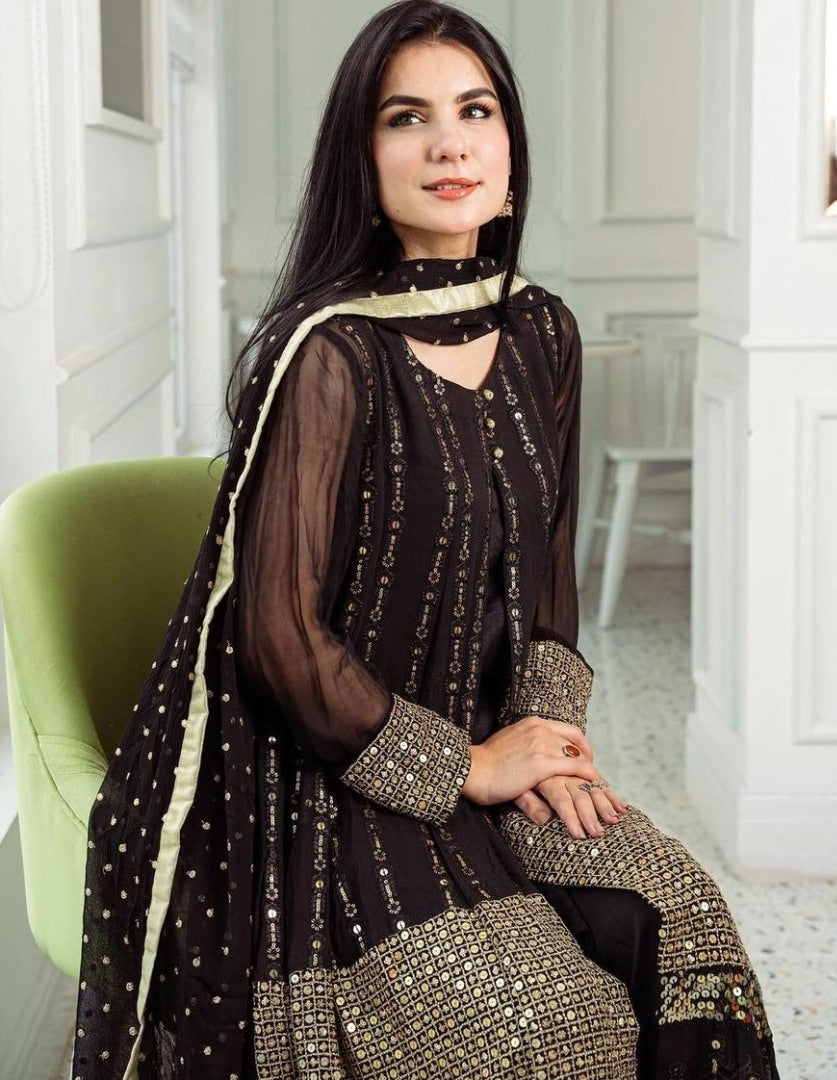 Black heavy embroidery worked salwar suit with shrug