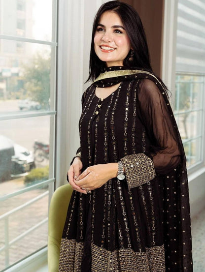 Black heavy embroidery worked salwar suit with shrug