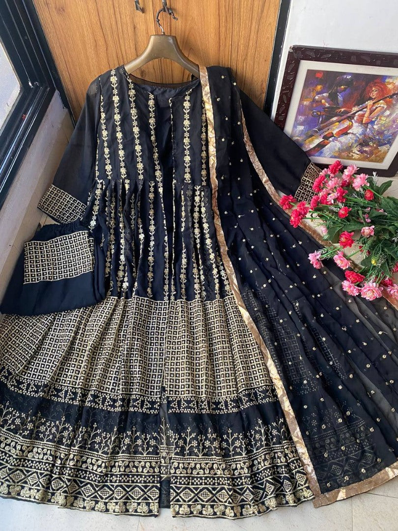 Black heavy embroidery worked salwar suit with shrug