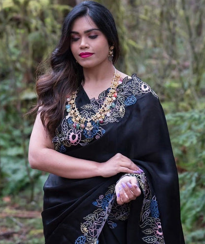 Black heavy organza silk embroidered border work party wear saree