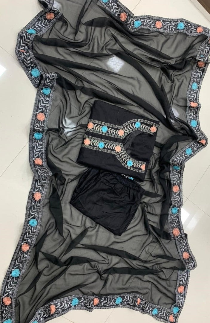 Black heavy rayon patch work party wear salwar suit with embroidered dupatta