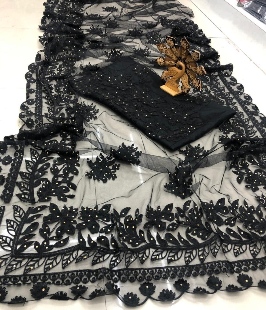 Black net heavy embroidered and stone worked designer saree