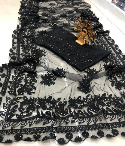 Black net heavy embroidered and stone worked designer saree