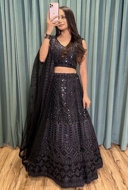 Black net heavy work ceremonial lehenga choli
