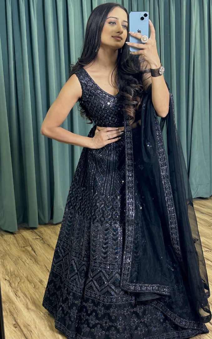 Black net heavy work ceremonial lehenga choli
