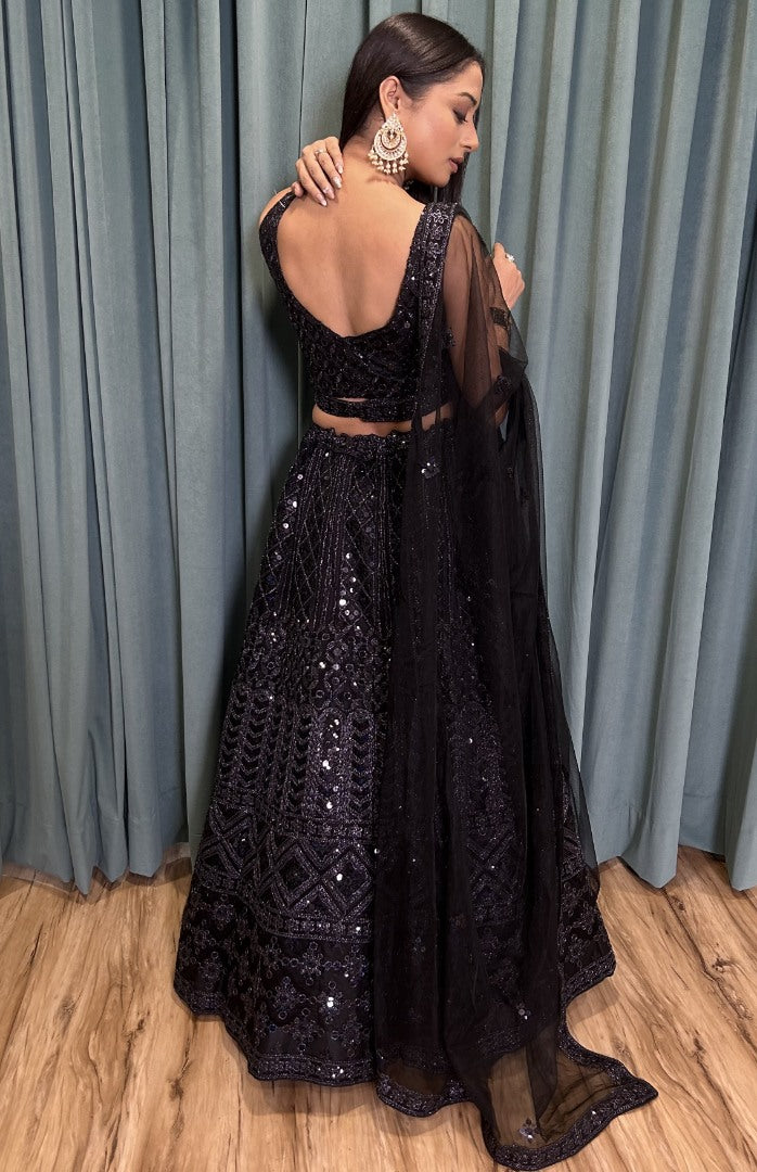 Black net heavy work ceremonial lehenga choli
