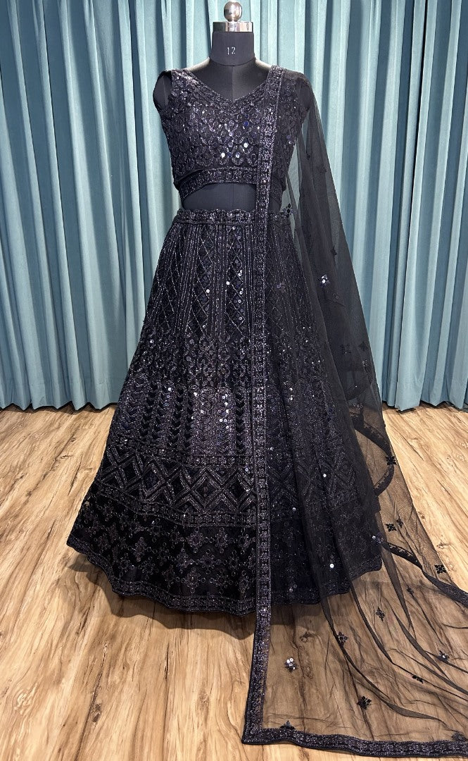 Black net heavy work ceremonial lehenga choli