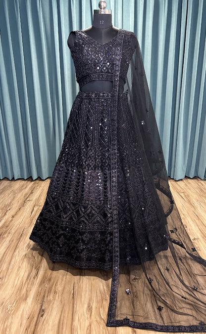 Black net heavy work ceremonial lehenga choli