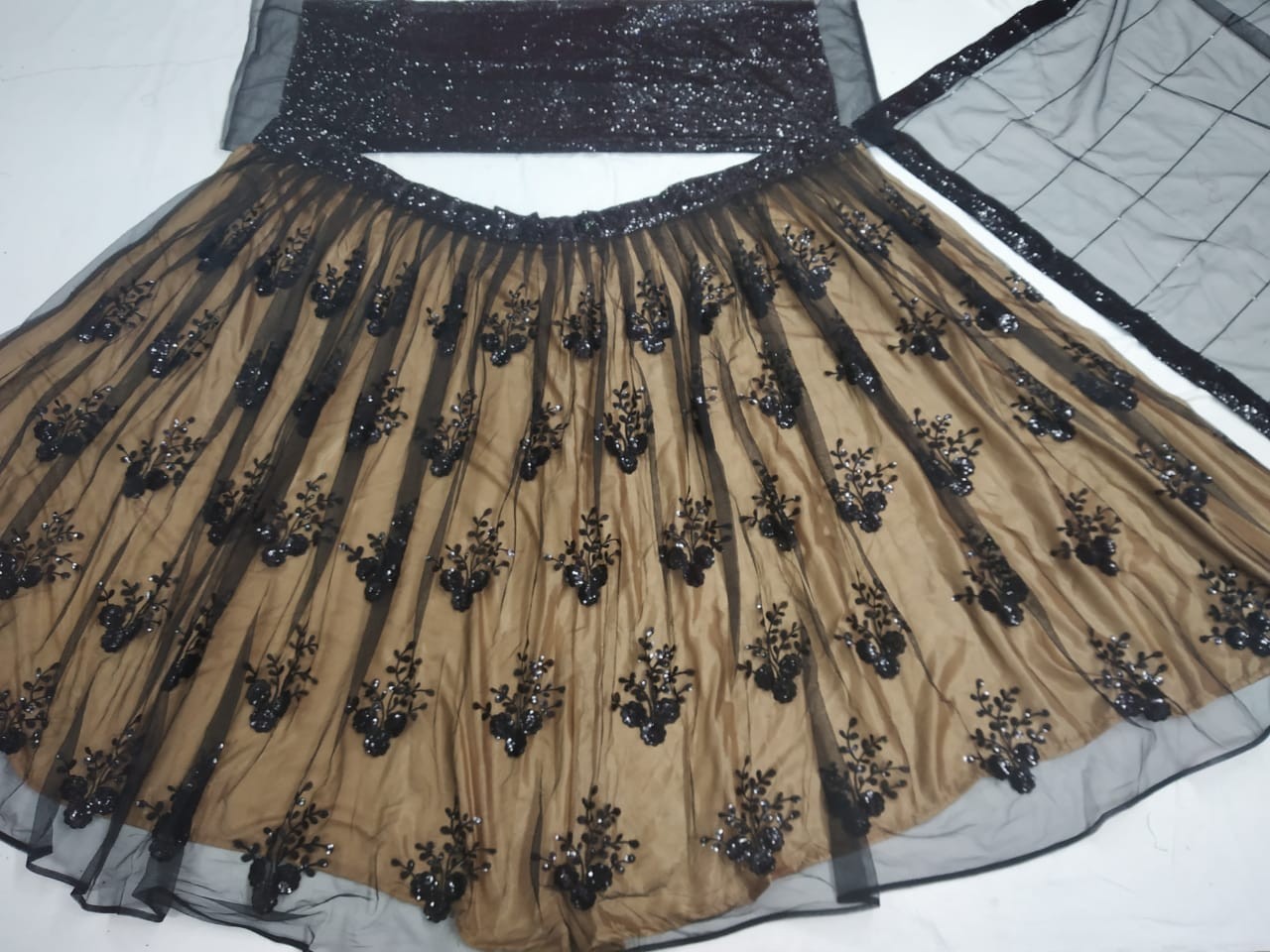 Black net sequence embroidered partywear lehenga choli