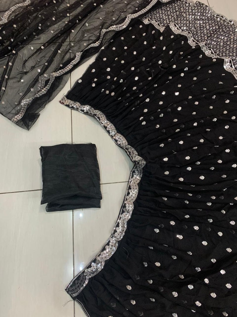 Black net silver sequence work wedding lehenga choli