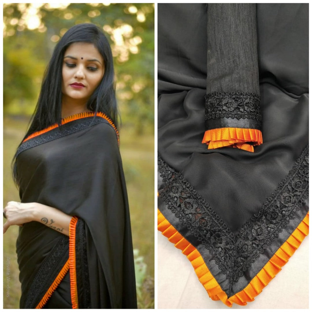 Black rangoli silk beautiful frill border partywear saree
