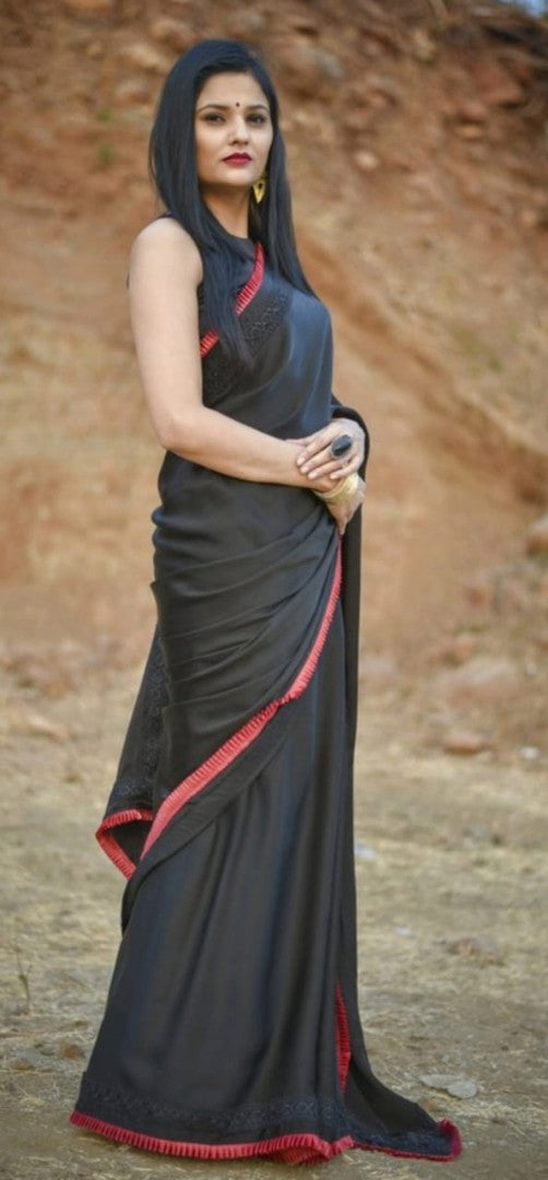 Black rangoli silk beautiful frill border partywear saree