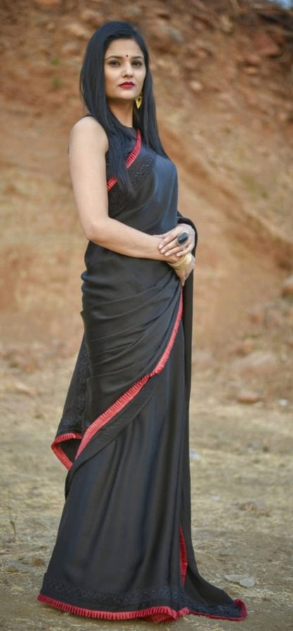Black rangoli silk beautiful frill border partywear saree