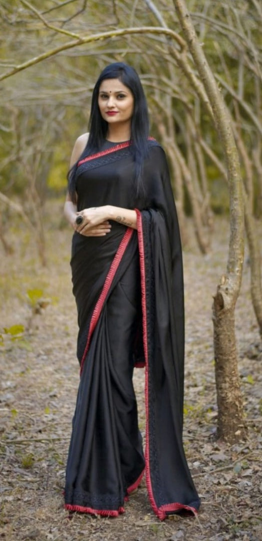 Black rangoli silk beautiful frill border partywear saree