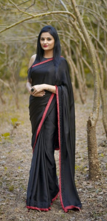 Black rangoli silk beautiful frill border partywear saree
