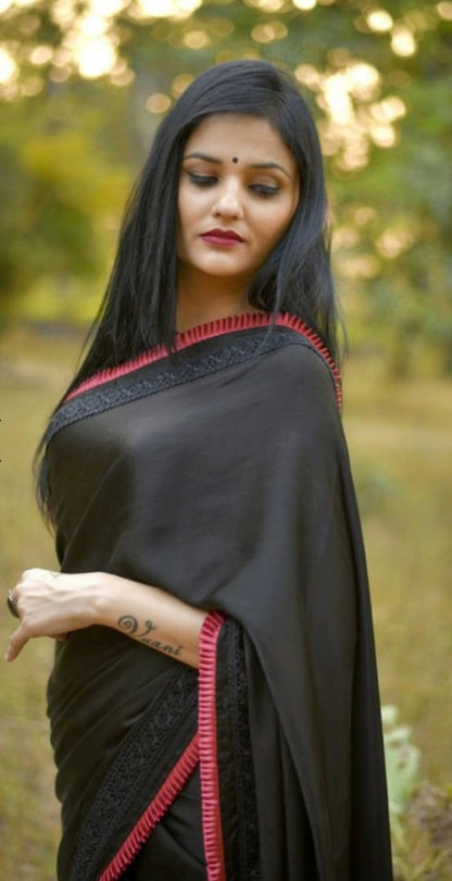 Black rangoli silk beautiful frill border partywear saree