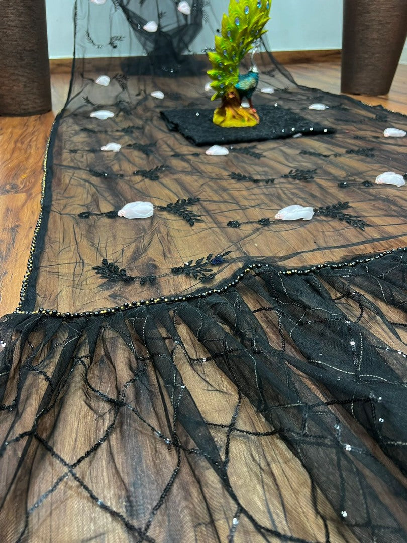 Black soft net sequence and hand worked partywear saree
