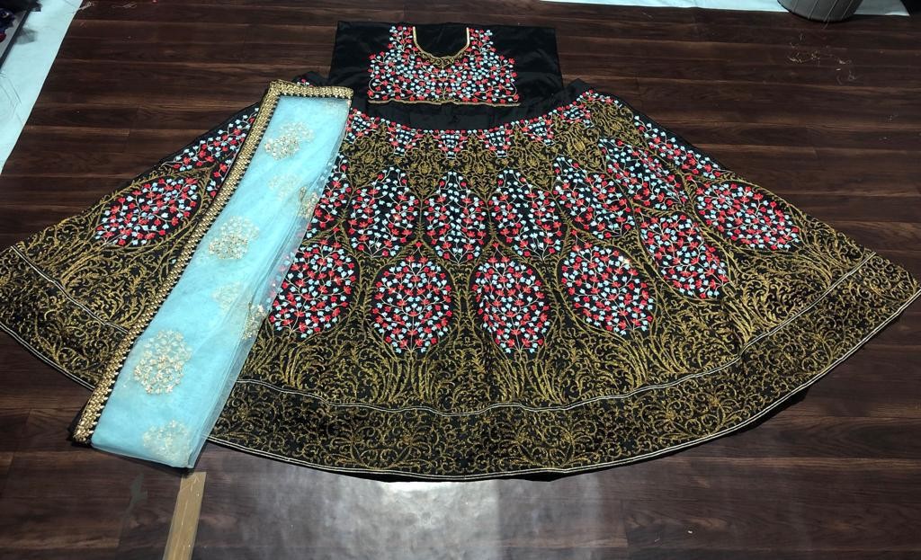 Black tapeta silk beautiful heavy embroidered wedding lehenga