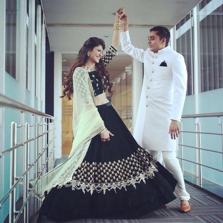 black tapeta silk embroidered ceremonial lehenga