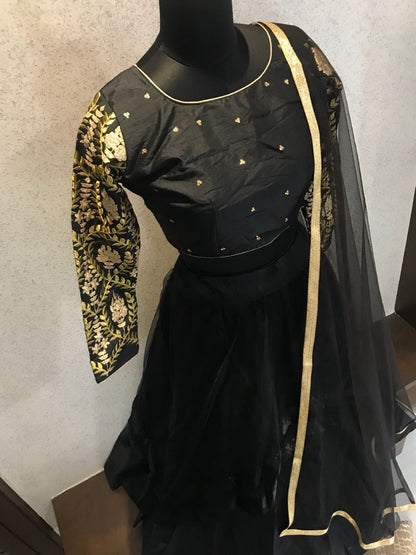 black tapeta silk partywear lehenga with embroidered blouse