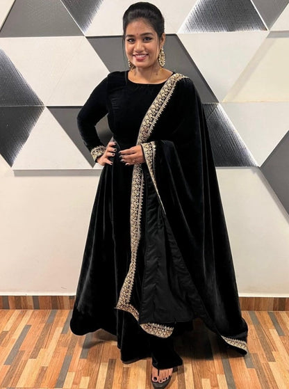 Black velvet embroidery worked long gown