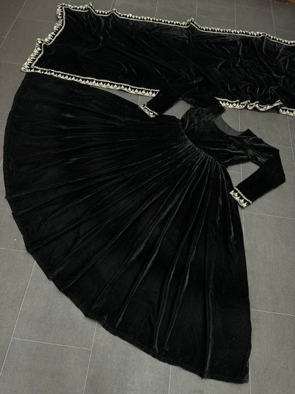 Black velvet embroidery worked long gown