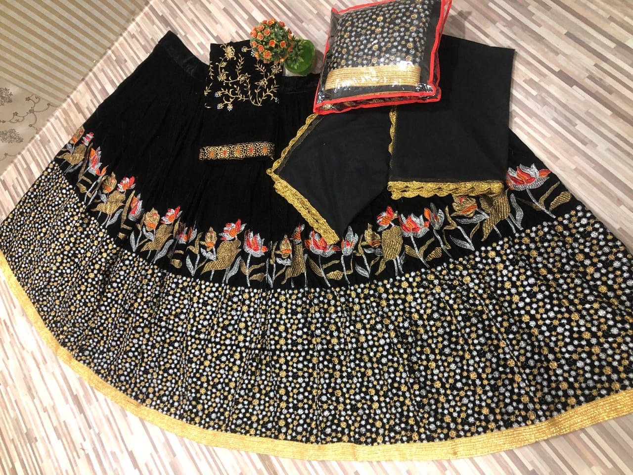 Black velvet heavy embroidered lehenga choli