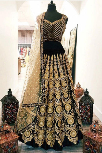 Black velvet heavy golden work wedding lehenga choli