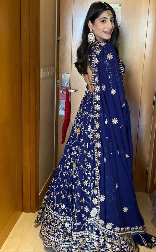 Blue geogette heavy sequence embroidered wedding lehenga choli
