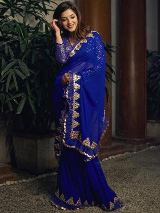 Blue georegette thread sequence and foil mirror work ruffle saree