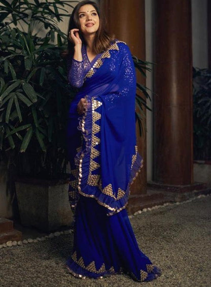 Blue georegette thread sequence and foil mirror work ruffle saree