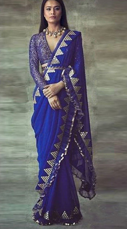 Blue georegette thread sequence and foil mirror work ruffle saree