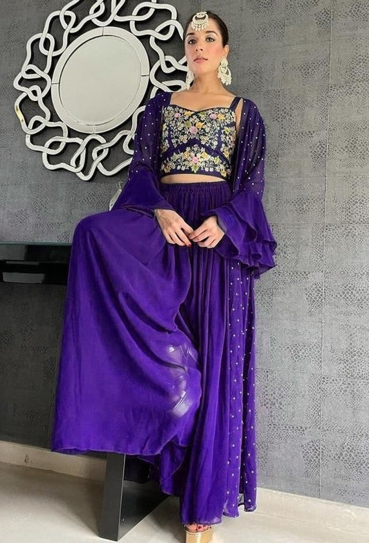 Blue georgette embroidered plazzo suit with shrug