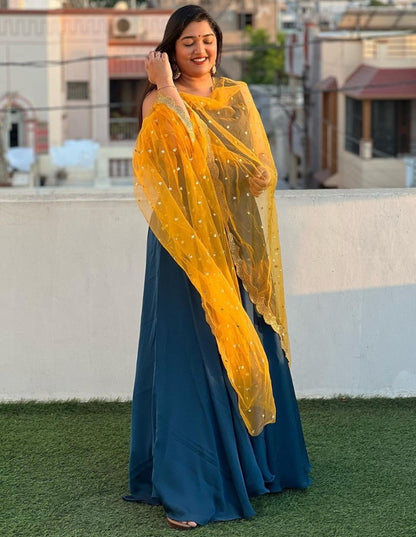 Blue georgette plain gown with yellow dupatta