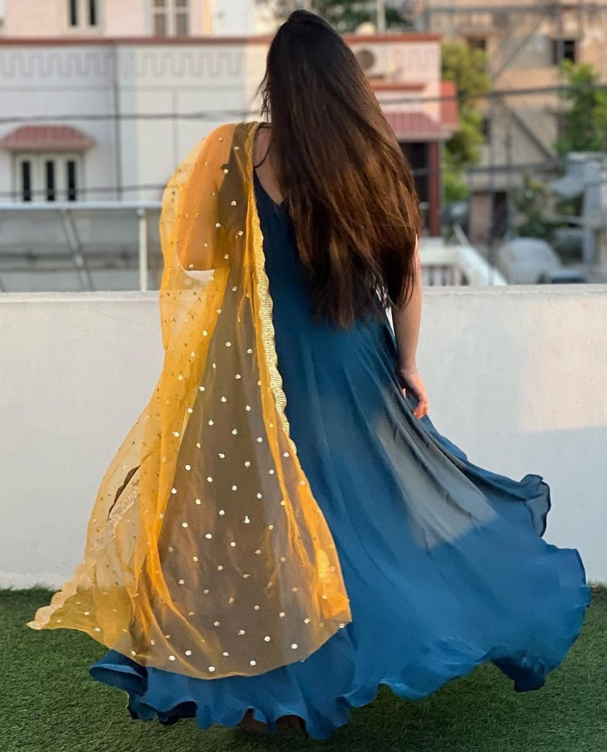 Blue georgette plain gown with yellow dupatta