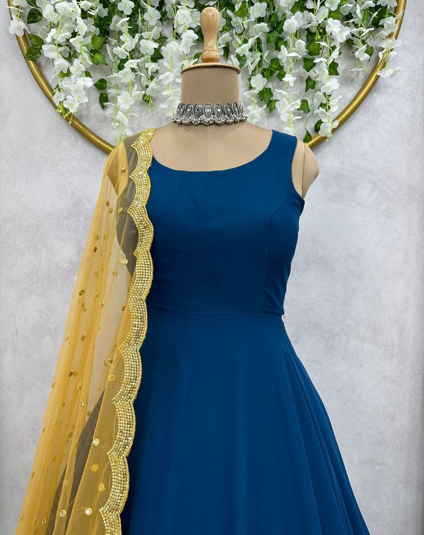 Blue georgette plain gown with yellow dupatta