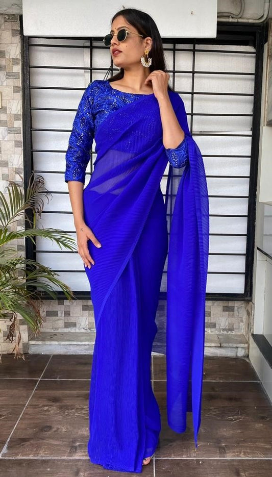 Blue georgette pleated partywear saree with heavy sequence work blouse