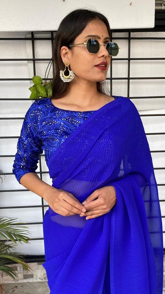 Blue georgette pleated partywear saree with heavy sequence work blouse