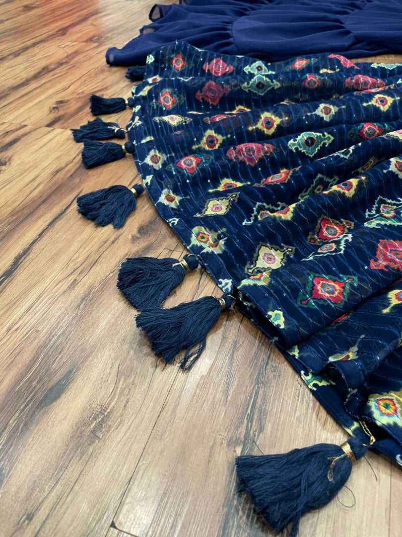 Blue georgette print and embroidered sharara salwar suit