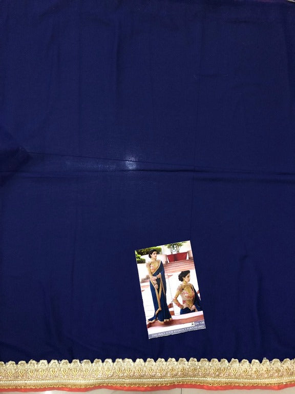 Blue georgette wedding saree with heavy embroidered blouse